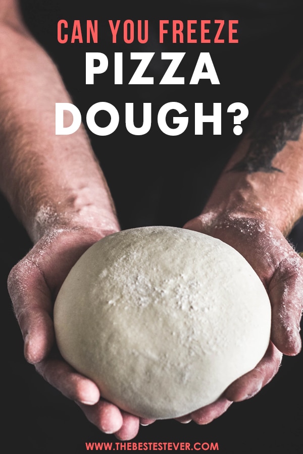 Man Holding a Neatly Rolled Pizza Dough