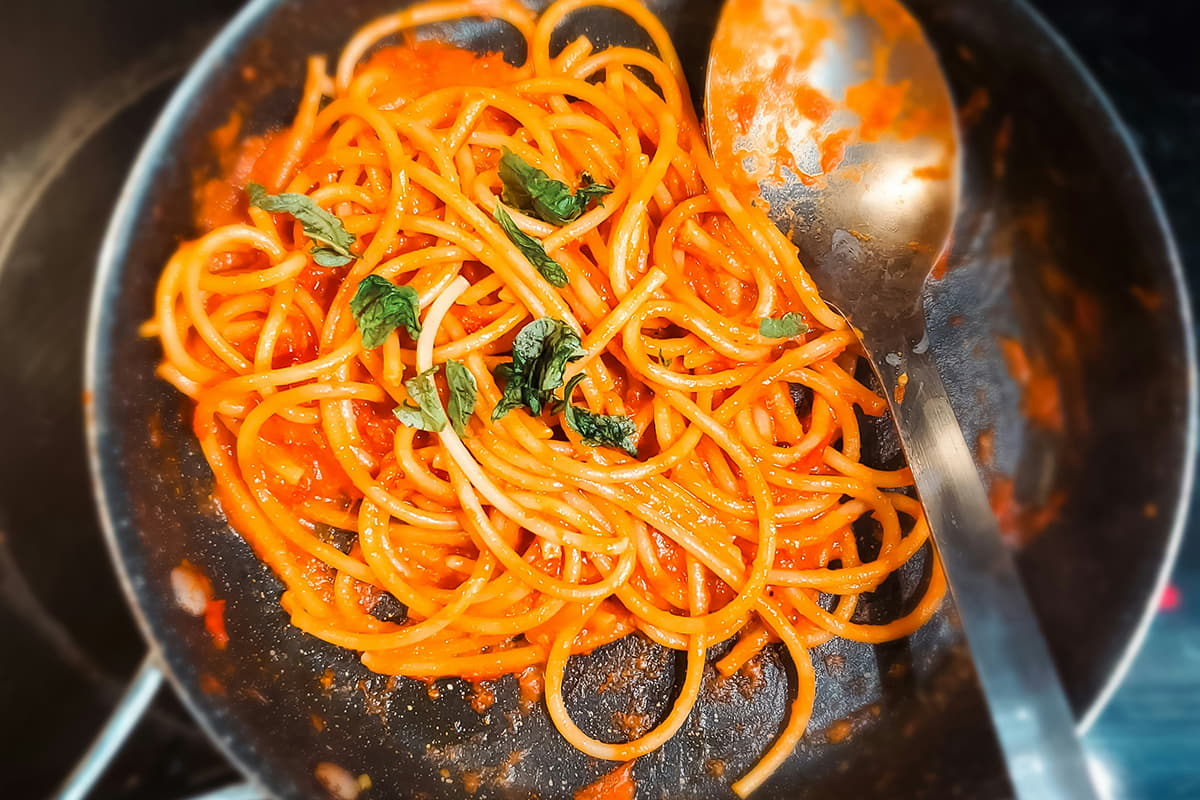 pasta in tomato sauce in a skillet
