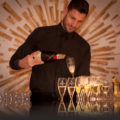 Man Pouring Champagne into Glasses