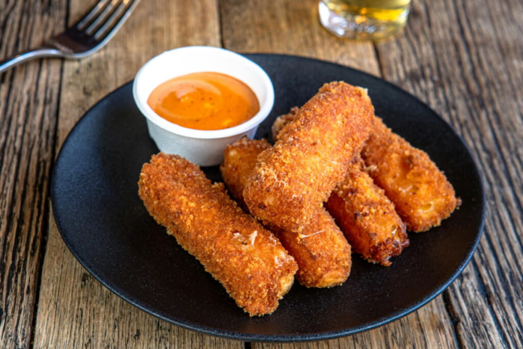Fried Mozzarella Sticks in a Plate