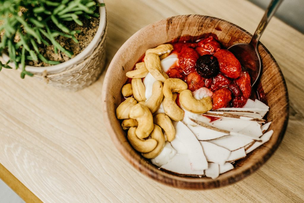 Wooden Bowl with fruit and nuts