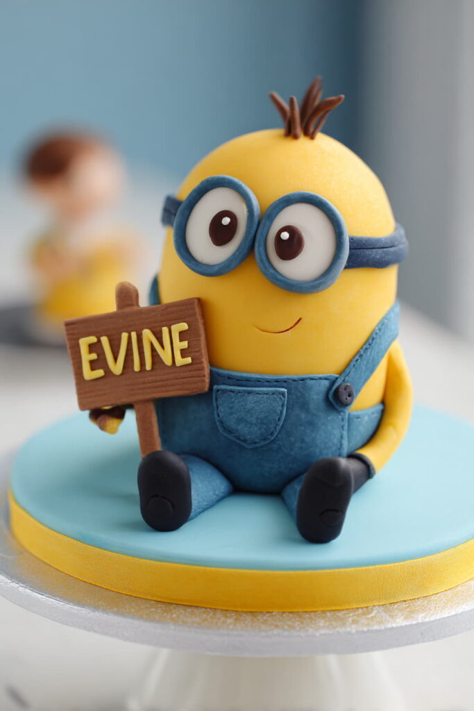 "A personalized full-body Minion cake holding a small fondant sign for the birthday child's name and age