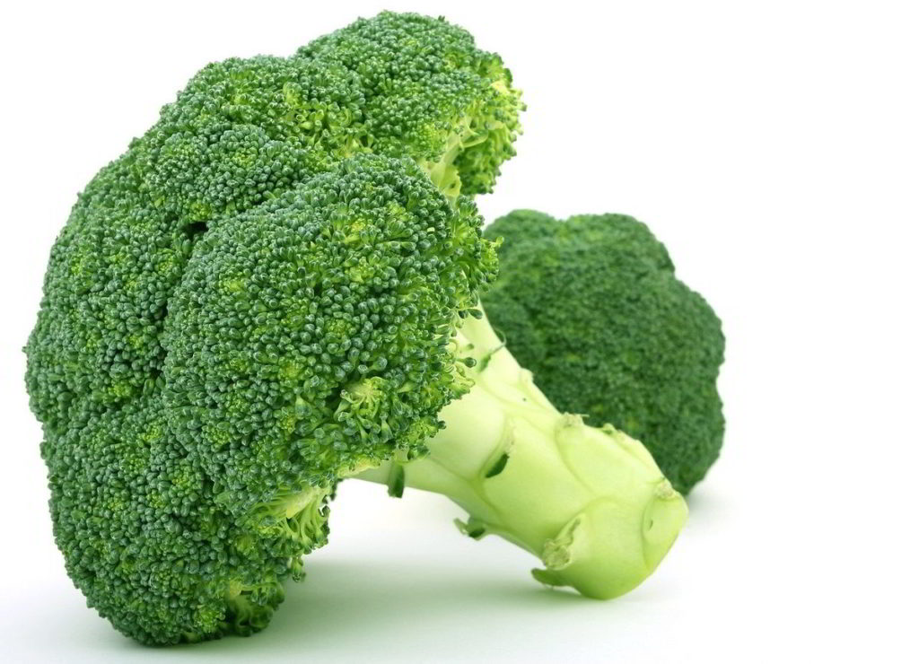 Head of Broccoli on a white table