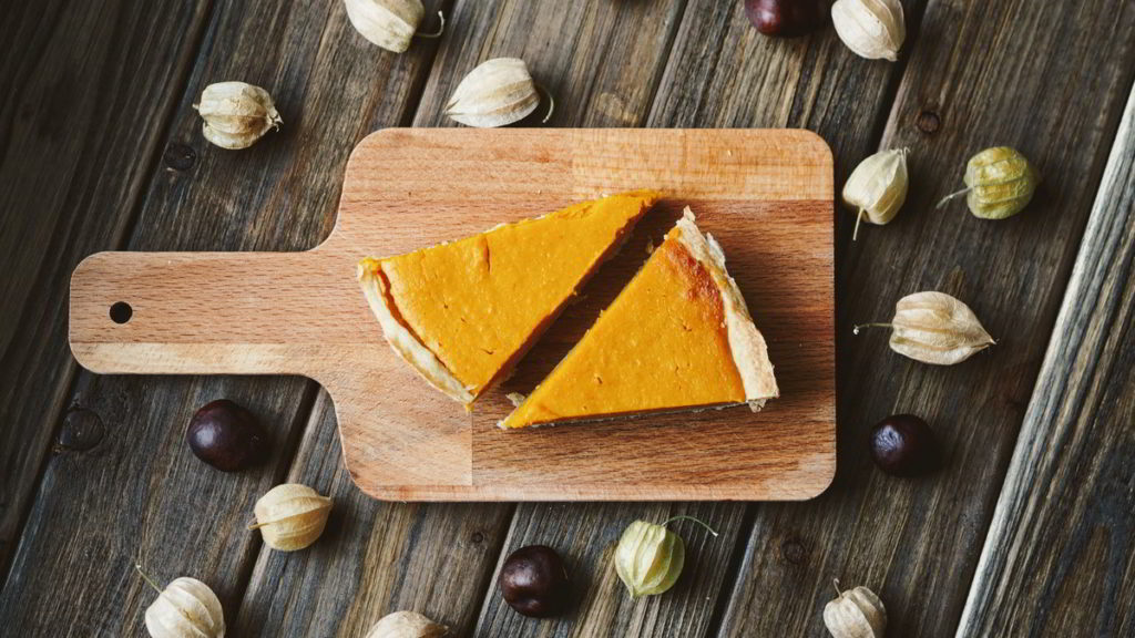 Slices of Pumpkin Pie on a Wood Serving Tray