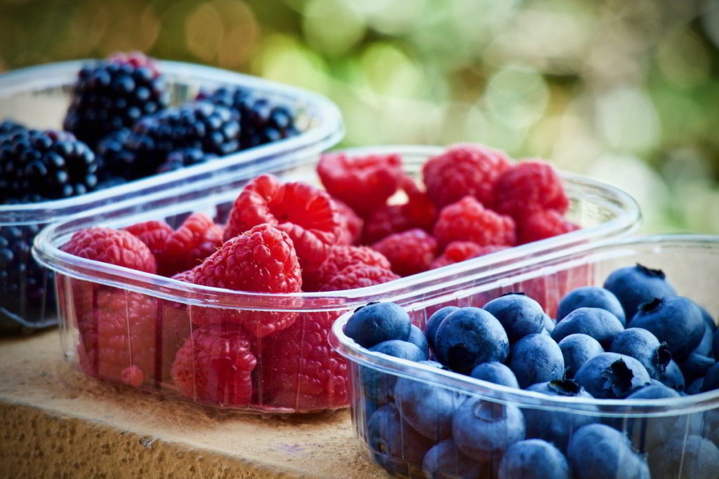 Berries (raspberries, blueberries & blackberries) in plastic containers