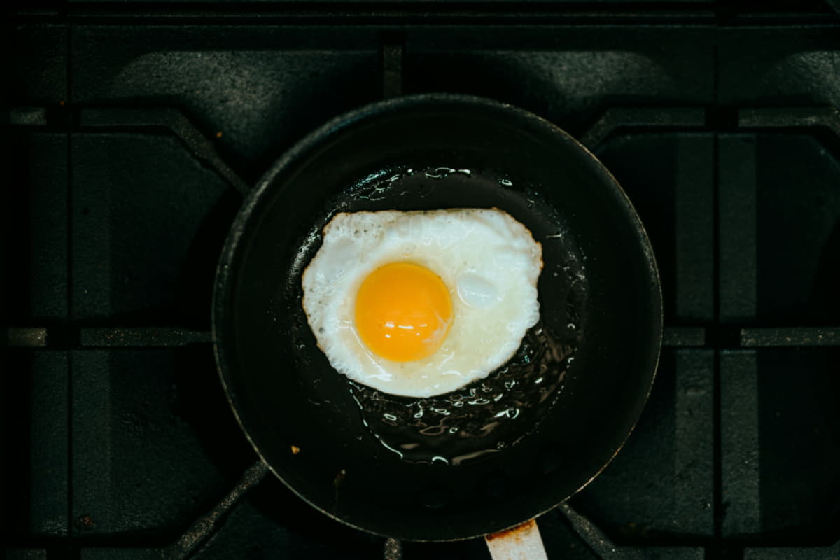overhead shot of a fried egg in a skillet