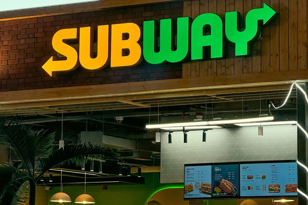 Subway sandwich shop with bread baking inside, known for its distinctive warm, sweet aroma.