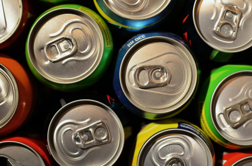 overhead shot of different soda cans