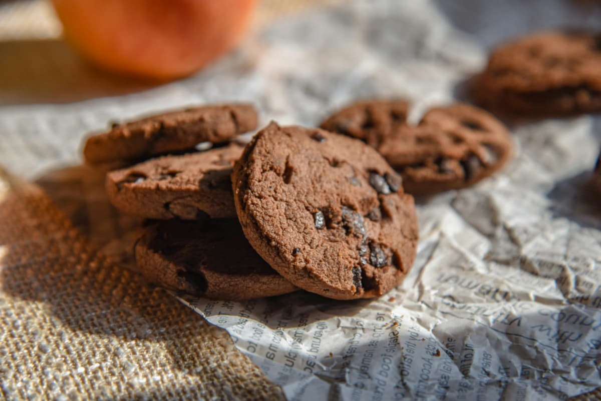 Chocolate chip cookies arranged on a surface, showing a common freezer-friendly type.